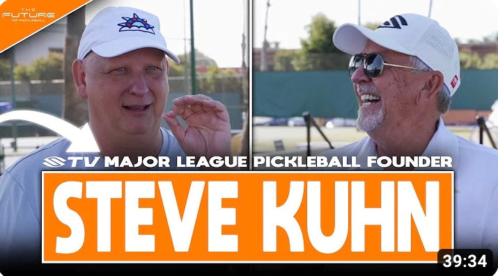 Steve Kuhn, Major League Pickleball Founder, with another individual, discussing pickleball.