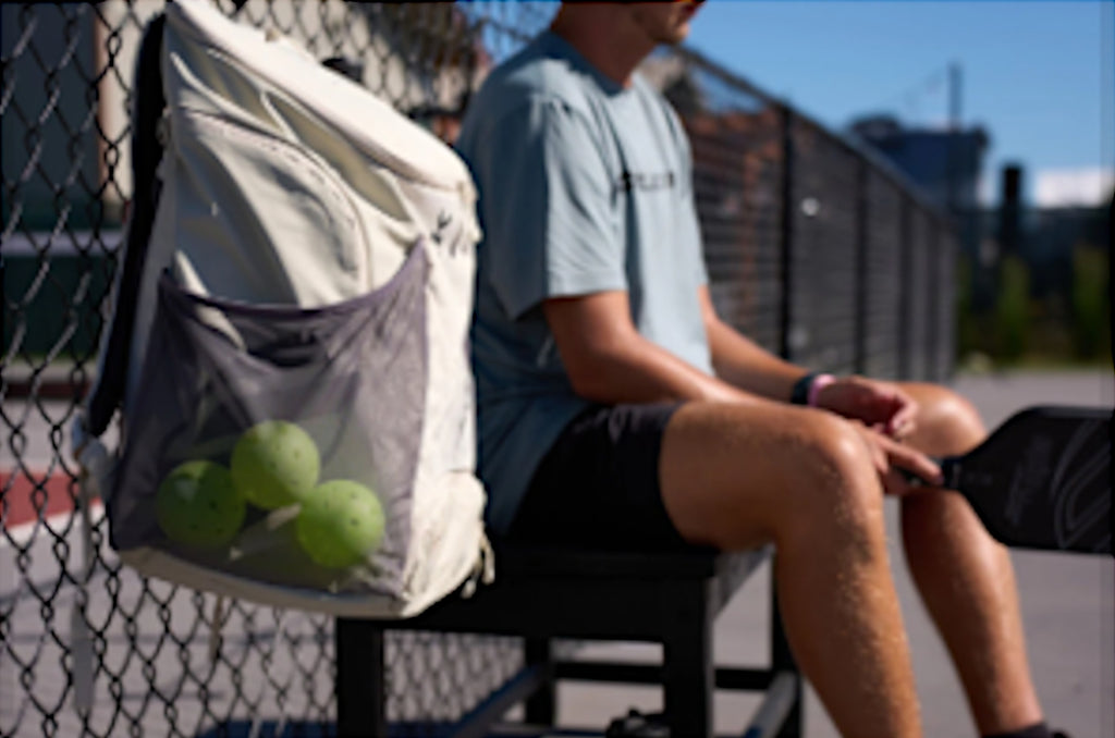 Why every pickleball player should clip their bag to the fence