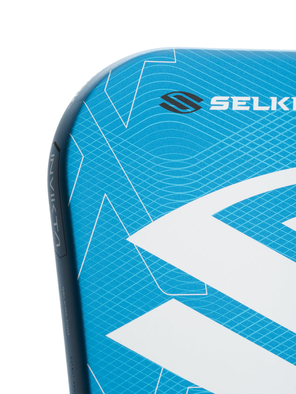 Selkirk LUXX Control Air Pickleball Paddle with InfiniGrit in the Invikta paddle shape. In blue, red, and purple.