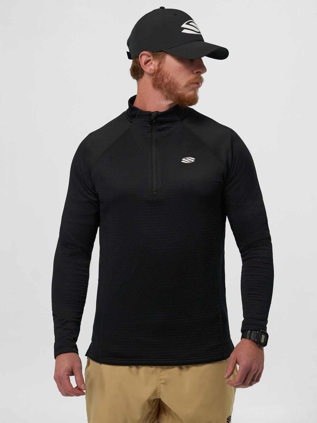 Model wearing a black Men's Pro Line 1/4 Zip Pullover