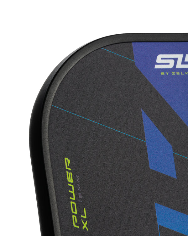Close-up of the SpinFlex+ surface on the SLK EVO Power paddle, showcasing its texture and design.