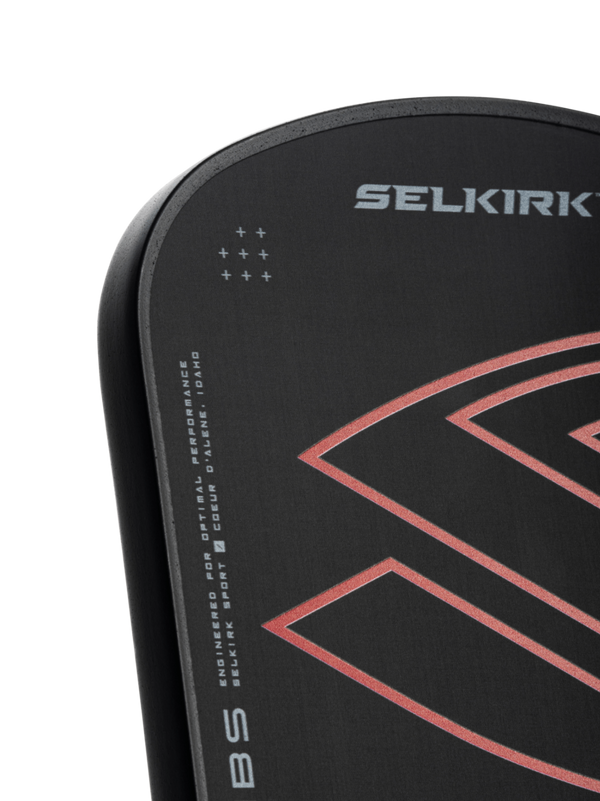 Selkirk LABS Project 008 pickleball paddle with black and red design.