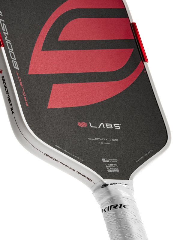 Selkirk LABS Project Boomstik pickleball paddle elongated shape in black, red, and white.