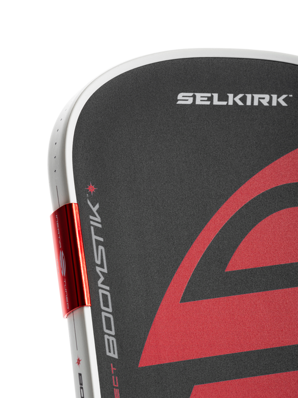 Selkirk LABS Project Boomstik pickleball paddle elongated shape in black, red, and white.