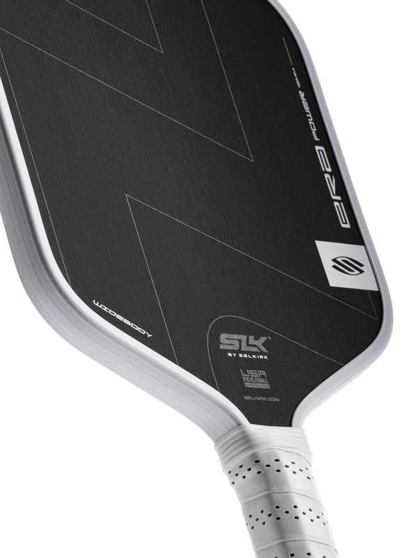 Selkirk SLK ERA Power pickleball paddle in black and white.