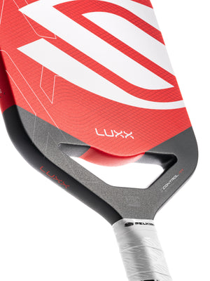 Selkirk LUXX Control Air Pickleball Paddle with InfiniGrit in the Epic paddle shape. In blue, red, and purple.