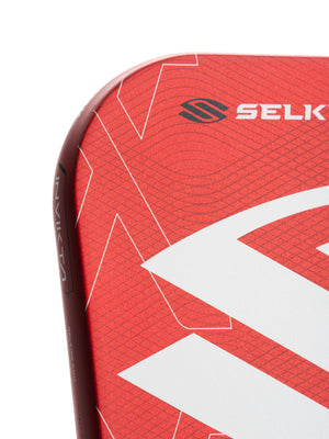 Selkirk LUXX Control Air Pickleball Paddle with InfiniGrit in the Epic paddle shape. In blue, red, and purple.
