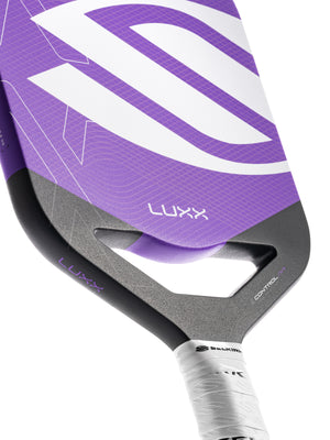 Selkirk LUXX Control Air Pickleball Paddle with InfiniGrit in the Epic paddle shape. In blue, red, and purple.
