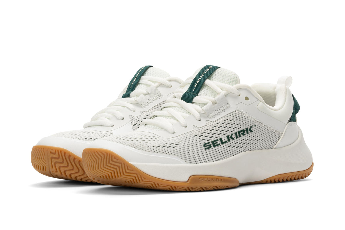 Selkirk Courtstrike women's pickleball shoes in white, green, and gum color.
