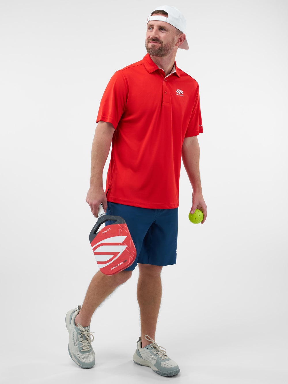 Selkirk Sport Essentials sports-wik men’s short-sleeved pickleball polo shirt.
