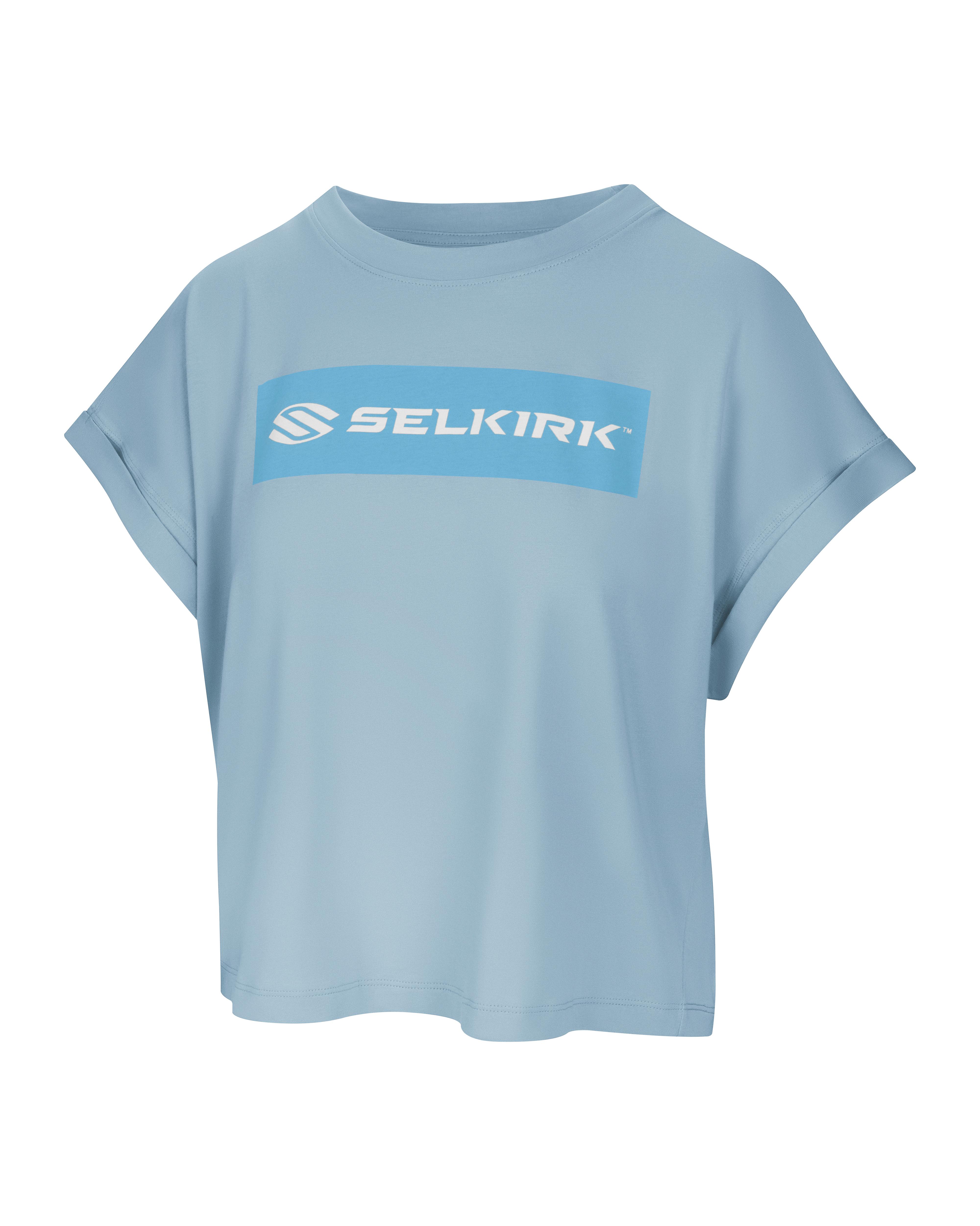 Light blue boxy tee with 'Selkirk Sport' logo in blue text
