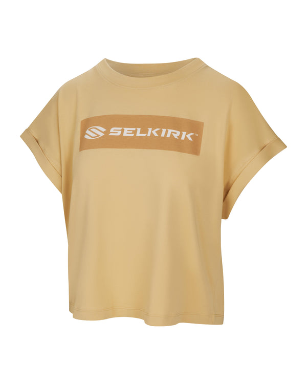 Tan Selkirk Sport Women's Sideline Soft Cotton Boxy Tee with 'Selkirk Sport' text on the front