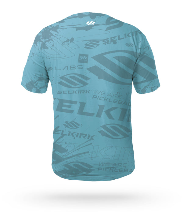 Crafted for Selkirk Sport pickleball athletes and fans, introducing the Selkirk Emblem Men's Short Sleeve pickleball shirt with Selkirk's Stretch-Wik Technology, in gray, blue, and green, for pickleball players.