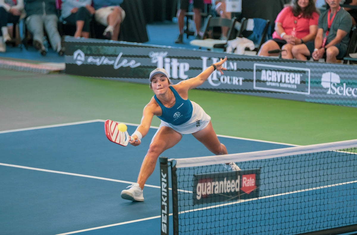 Catherine Parenteau lunges to hit a pickleball near the net during a match at the PPA Austin Showdown