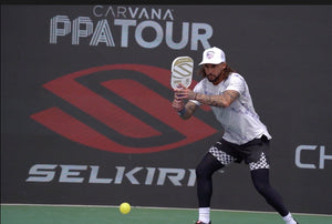 Professional pickleball player in a ready stance with paddle during the PPA Tour Selkirk tournament