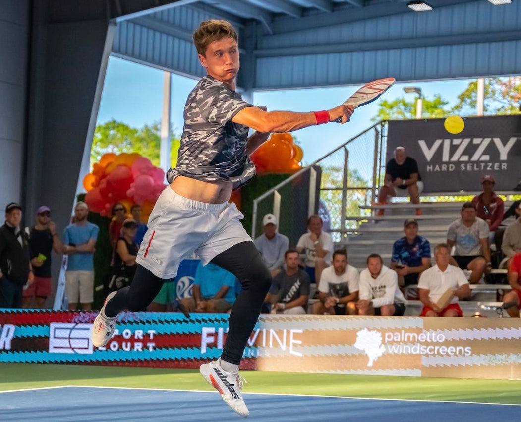 Player executing a shot during a pickleball match at the PPA Orange County Cup.