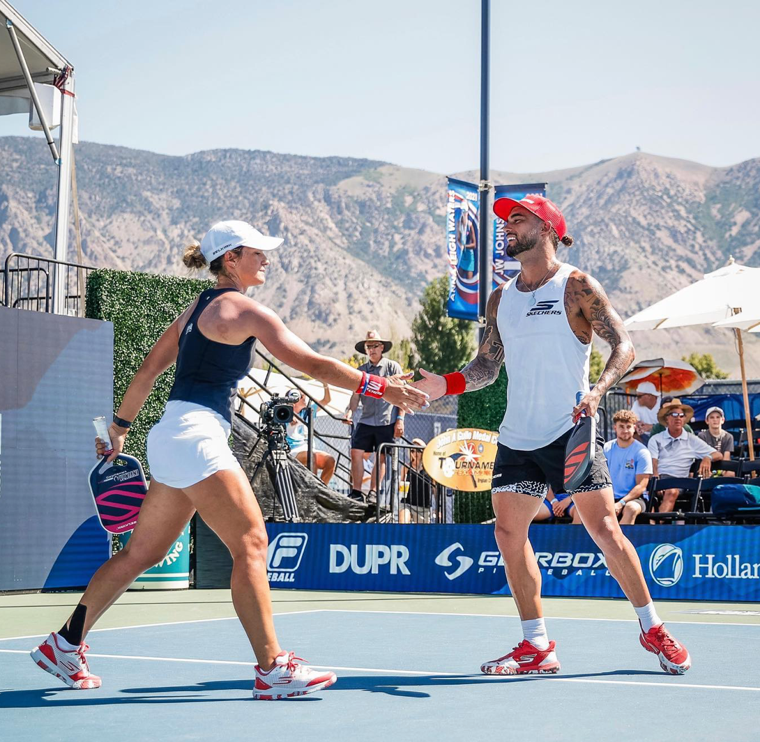 Players shaking hands after a match at the TOC tournament