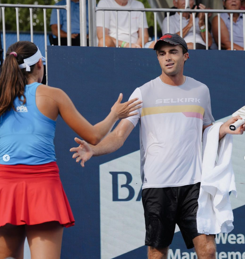 Ben Johns and Anna Leigh Waters interacting during a match at the PPA Cincinnati tournament.