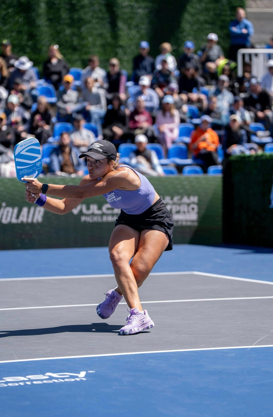 Catherine Parenteau playing pickleball in a tournament setting