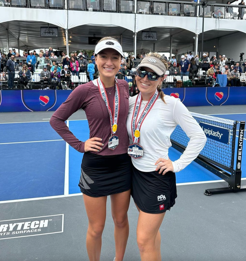 Anna Leigh Waters and Catherine Parenteau posing with medals after the Women’s Final at the BioFreeze National Championships.