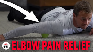 Man lying on stomach using a pickleball under his arm for elbow pain relief, with text 'ELBOW PAIN RELIEF'