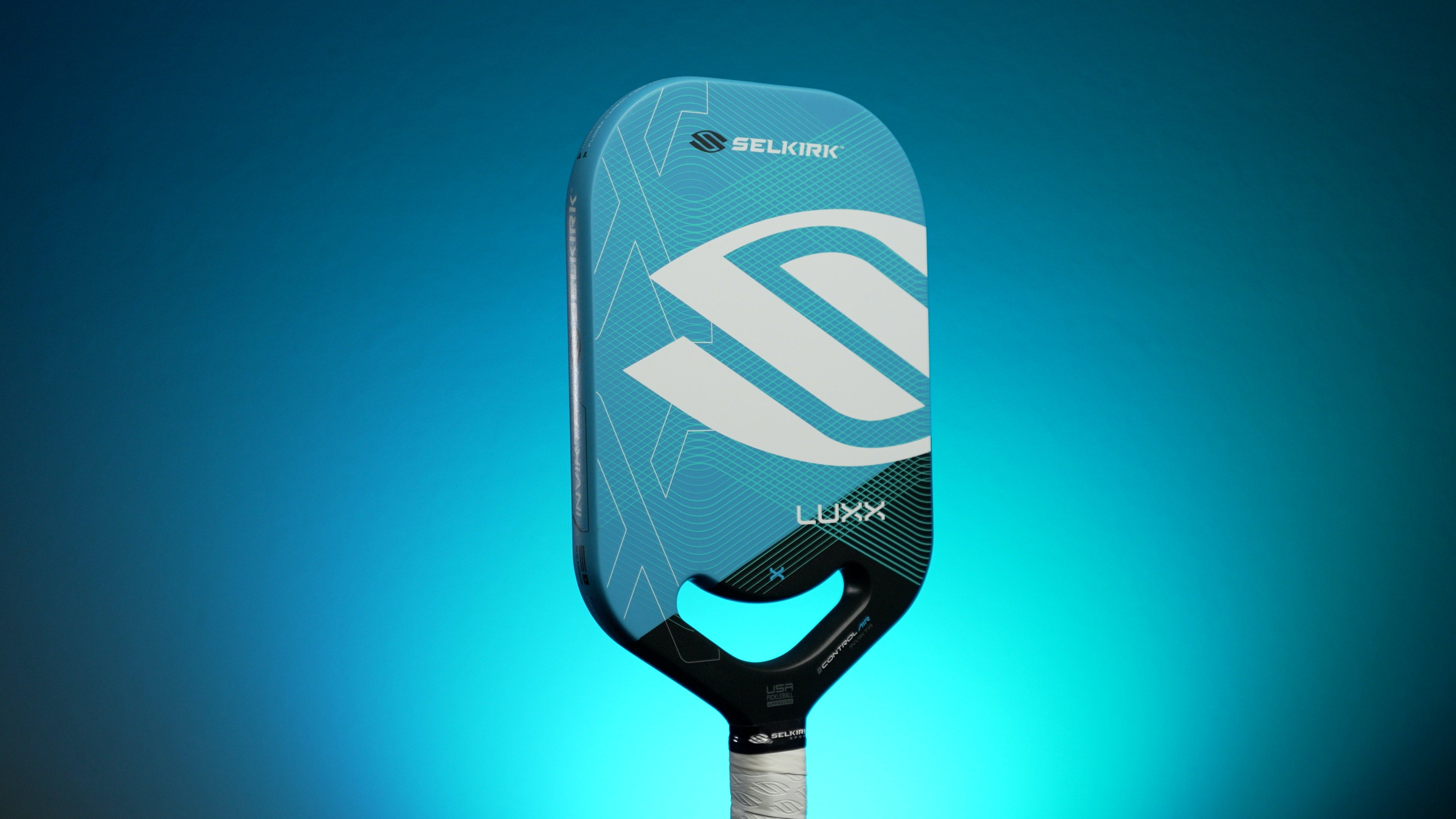 Luxx Control Air paddle showcasing Florek Carbon Fiber technology against a blue background