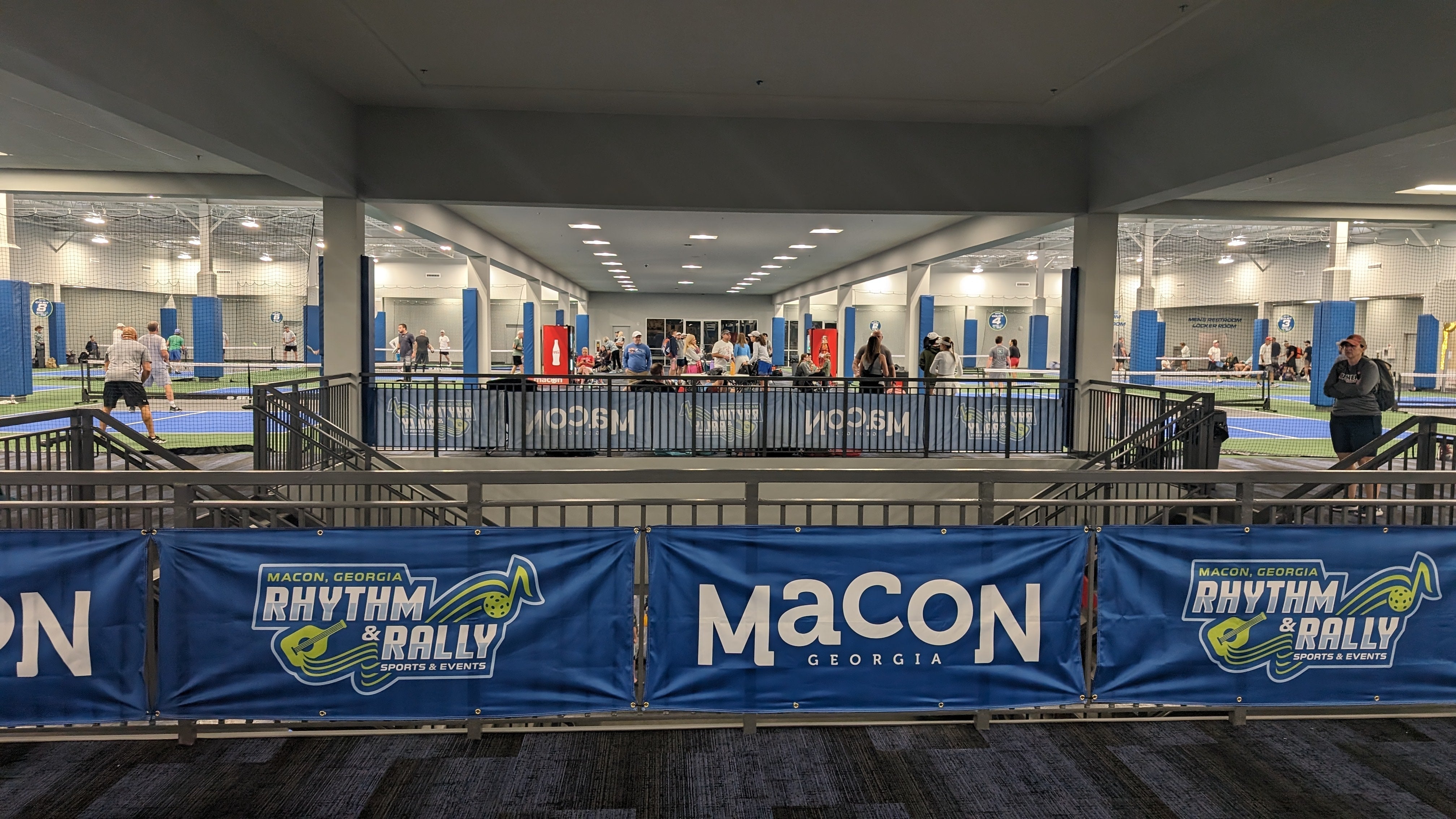 View of the indoor pickleball courts at Rhythm & Rally Sports and Events in Macon Mall