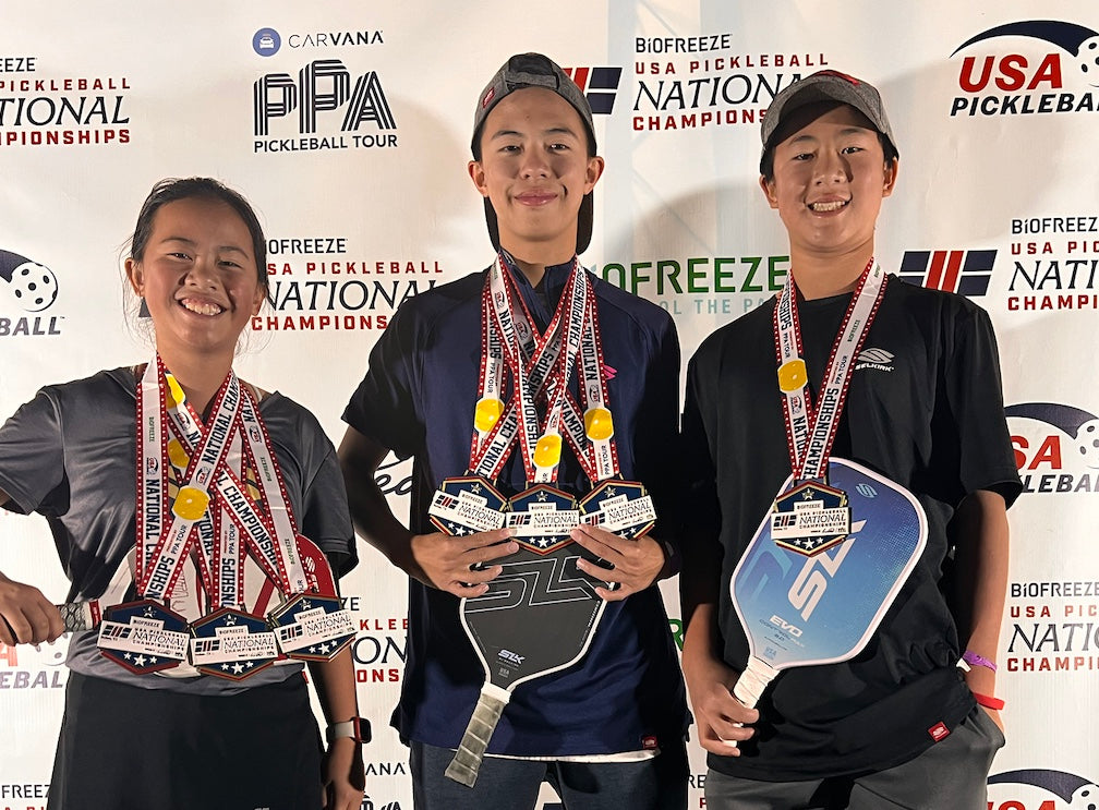 The Lam children holding medals at the 2023 Biofreeze USA Pickleball National Championships