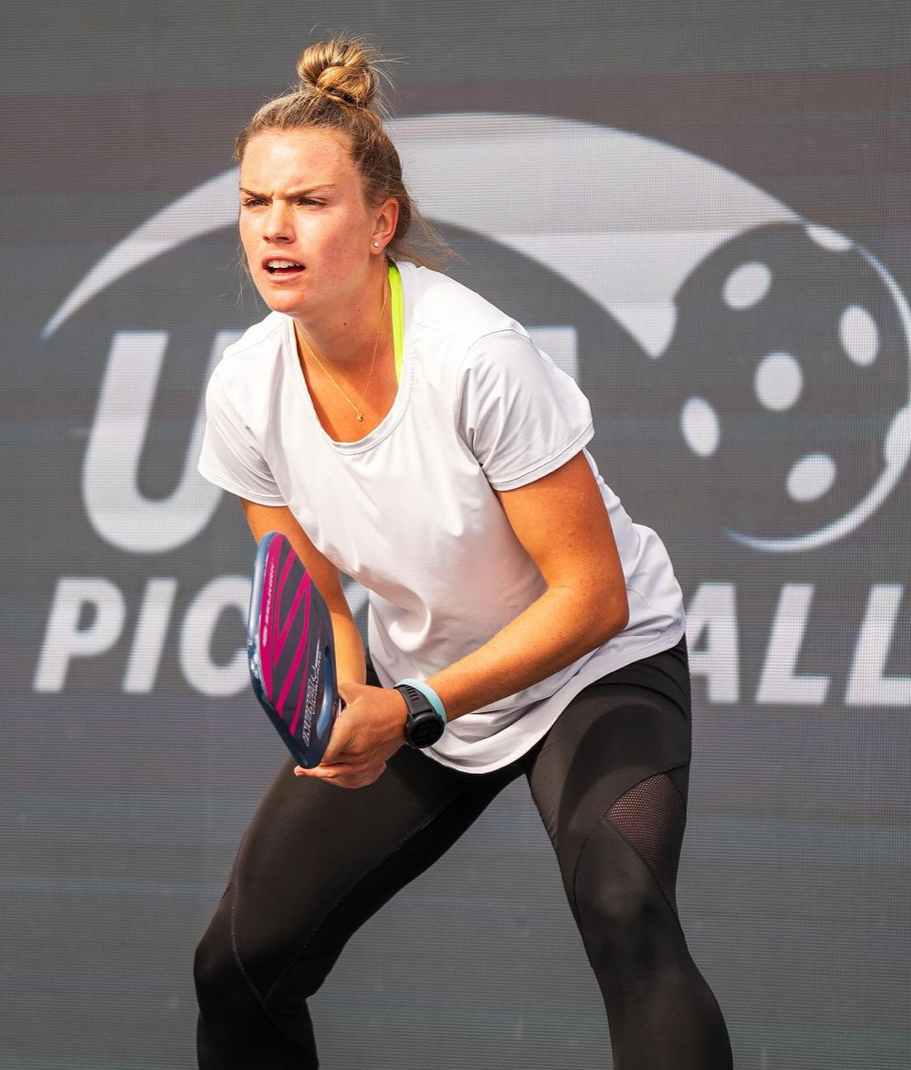 Judit Castillo preparing to serve during a match at the Austin Open