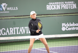 Cammy MacGregor prepares to hit a volley with her Selkirk paddle during a professional tournament. 