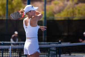 Pro pickleball player Catherine Parenteau follows through a groundstroke with her Selkirk LABS Project 007 pickleball paddle. 
