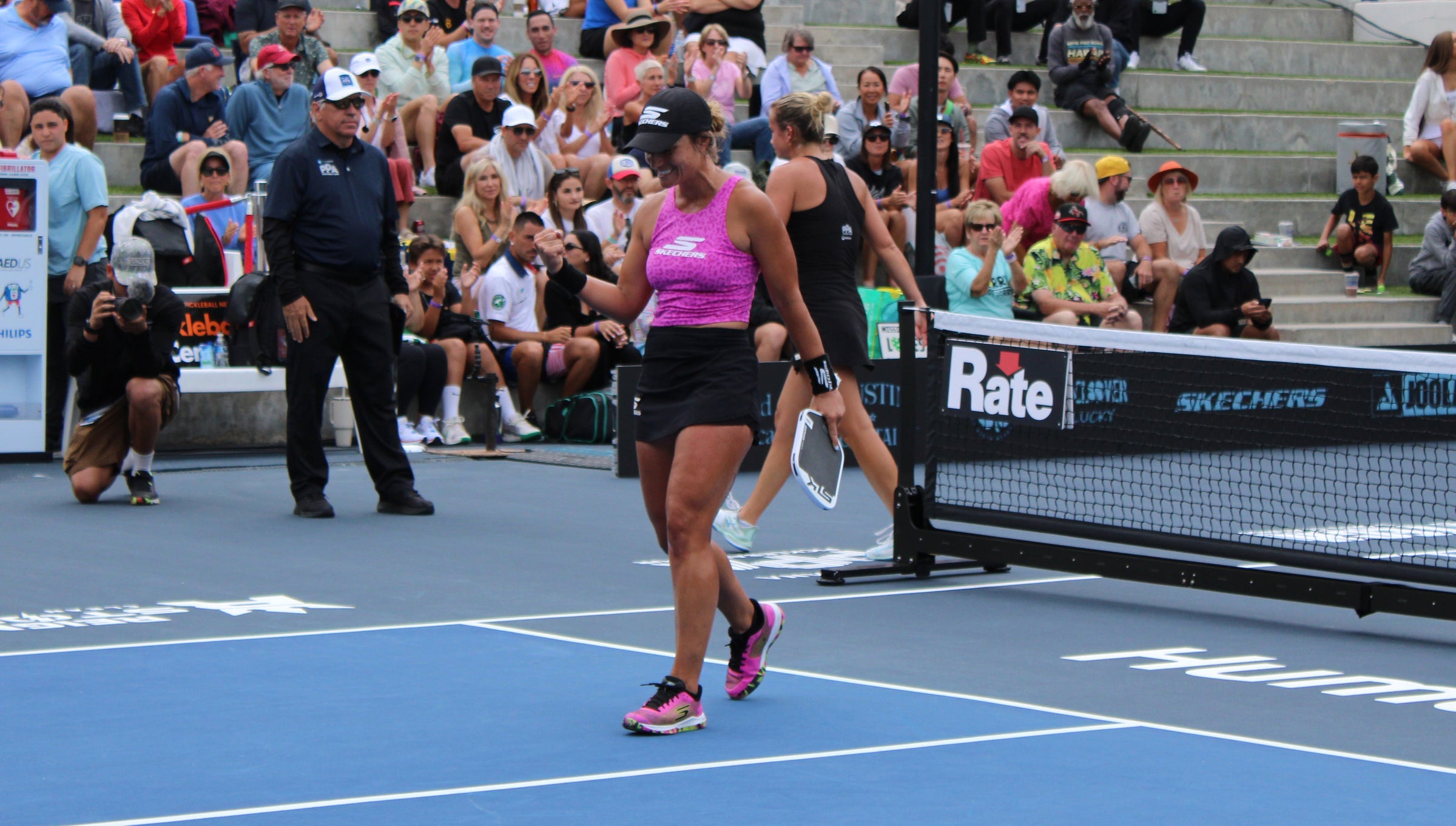 Catherine Parenteau fist pumping after winning her singles quarterfinals match