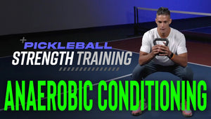 Pickleball strength training focusing on anaerobic conditioning with a person squatting and holding a kettlebell.