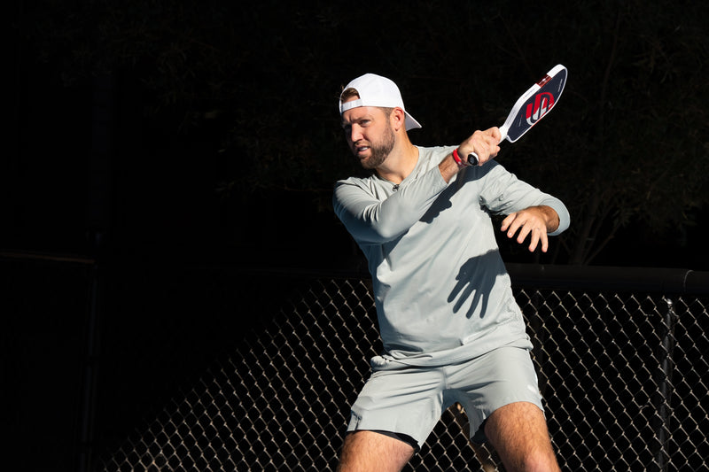 Jack Sock hits a forehand with the Jack Sock signature paddle