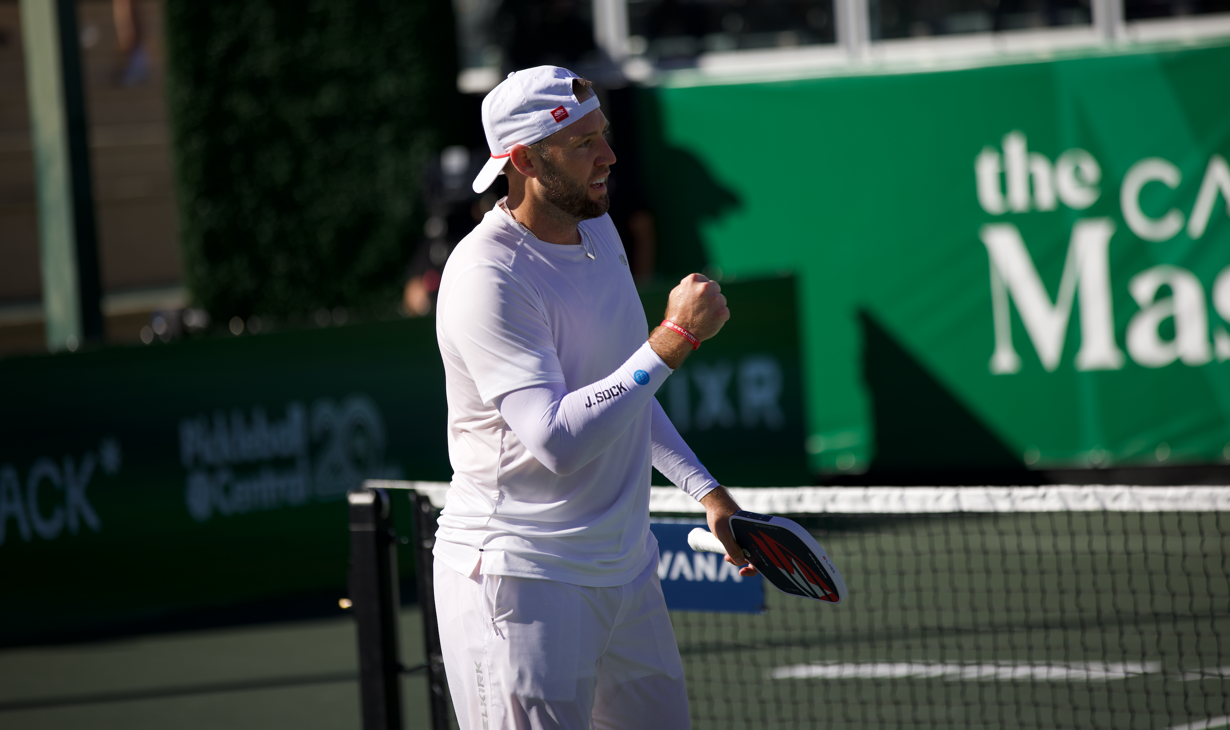 Jack Sock fist pumps in men's singles final