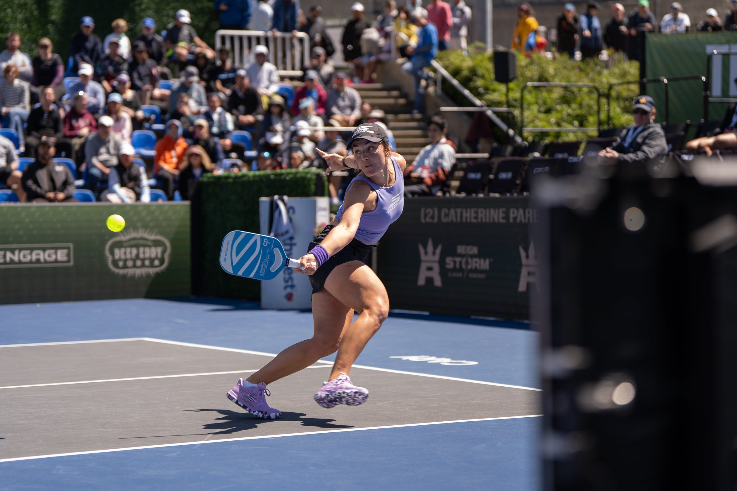 Pro pickleball player Catherine Parenteau hits a backhand drive. 
