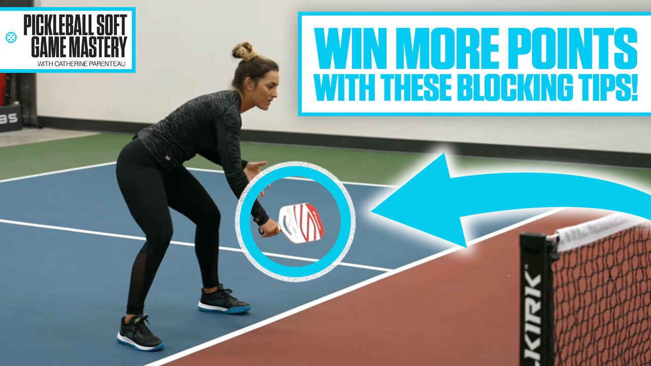 Player demonstrating a pickleball block volley technique with paddle positioned to absorb the ball.