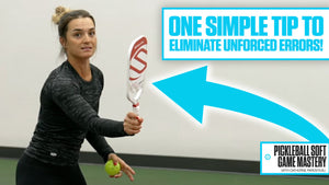 A woman demonstrating how to hold a pickleball paddle, with a tip to eliminate unforced errors.