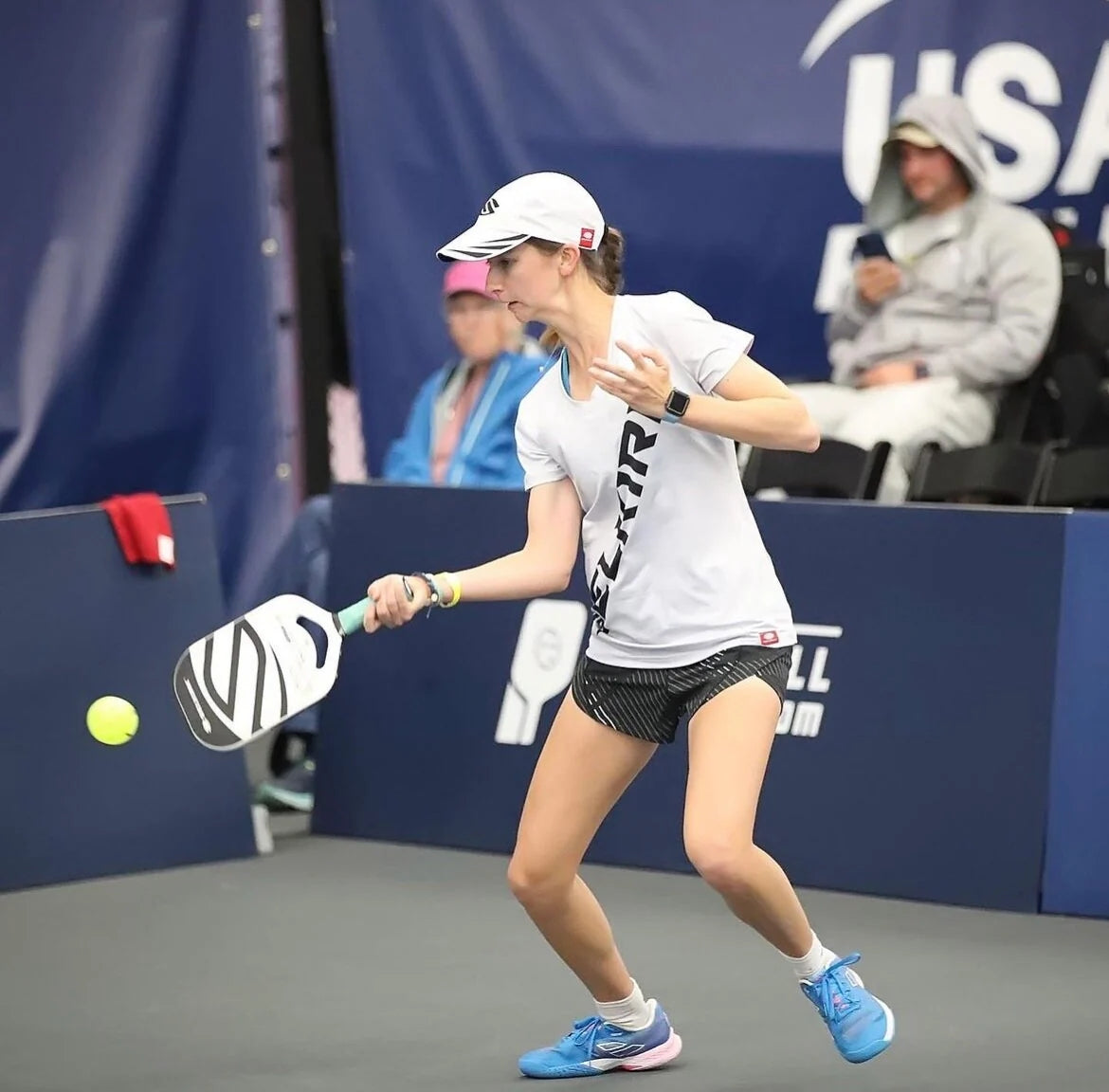 Rachel Summers playing pickleball in a competitive match.