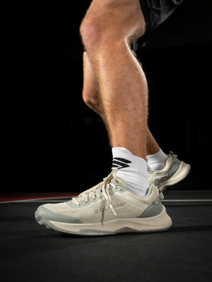 Men's CourtStrike Pickleball Shoes in White Pine, shown on a player's foot during play.
