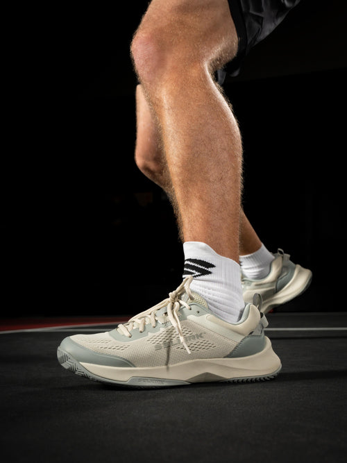 Men's CourtStrike Pickleball Shoes in White Pine, shown on a player's foot during play.
