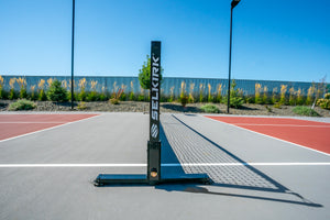 Selkirk Semi-Permanent Pro Pickleball Net set up on a court