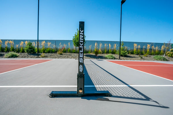 Selkirk Semi-Permanent Pro Pickleball Net set up on a court