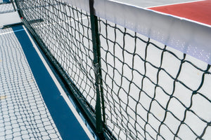 Close-up of the Selkirk Semi-Permanent Pro Pickleball Net showing the netting and frame.