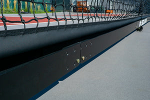 Close-up of the Selkirk Semi-Permanent Pro Pickleball Net's lower frame and net attachment.