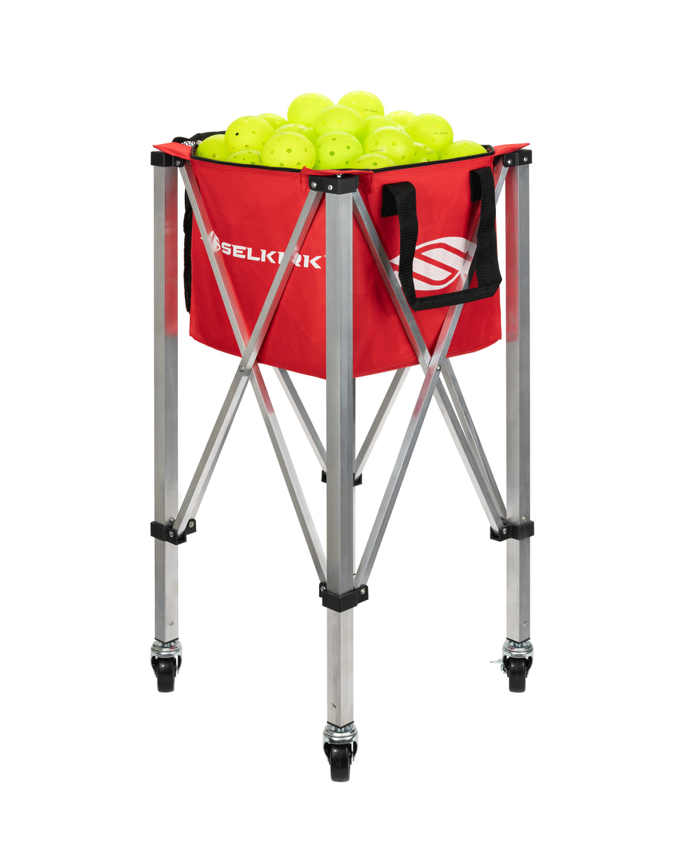 Selkirk Pickleball Ball Carrier with yellow balls in a red basket on a collapsible frame