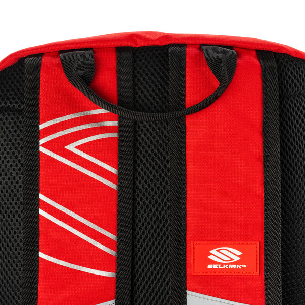 Red Selkirk Core Line Day Bag with padded straps and mesh back
