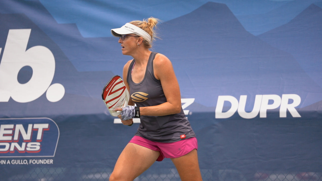 susannah barr at a pickeball tournament holding her paddle