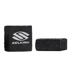 Two Selkirk Raw Carbon Fiber Cleaning Blocks, one upright and one flat, showing the logo.