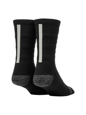 Rear three-quarter view of Selkirk Courtlock crew pickleball socks showcasing vertical gray back stripe and gray reinforced heel on white background